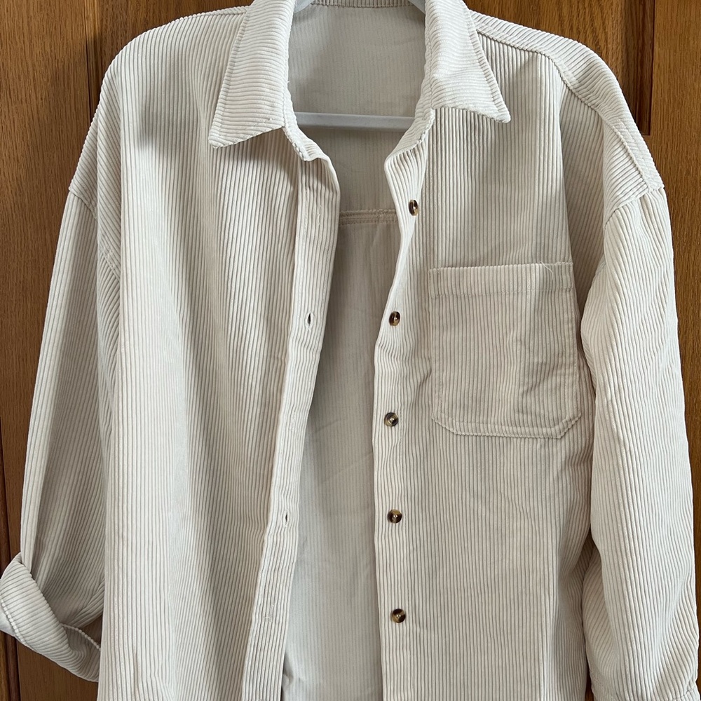 Size medium, corduroy button down shirt.